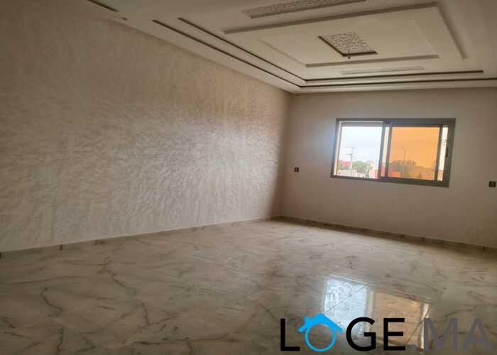 Appartement de 113 m2 de 2 façades dans une R+2 escalier privative a al bosstane El jadida.