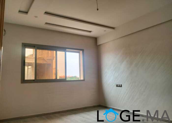Appartement de 113 m2 de 2 façades dans une R+2 escalier privative a al bosstane El jadida.