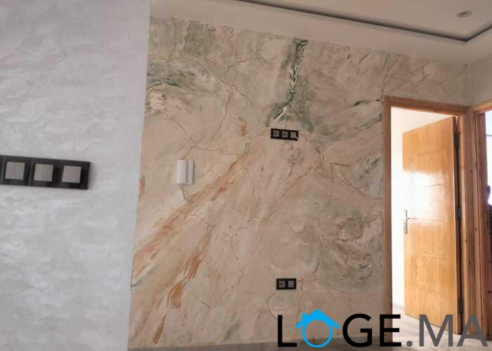 Appartement de 113 m2 de 2 façades dans une R+2 escalier privative a al bosstane El jadida.