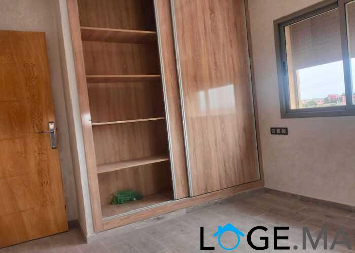 Appartement de 113 m2 de 2 façades dans une R+2 escalier privative a al bosstane El jadida.
