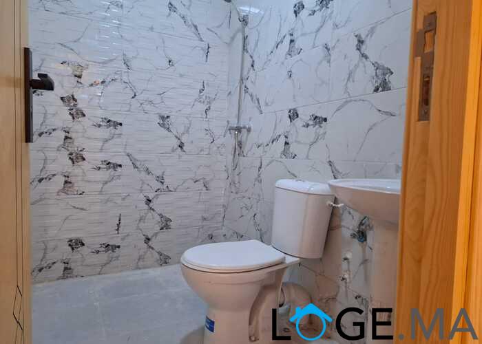 appartement de 103 m2 habitable avec escalier privative 2 façades dans R+2 a al bousstan el jadida.