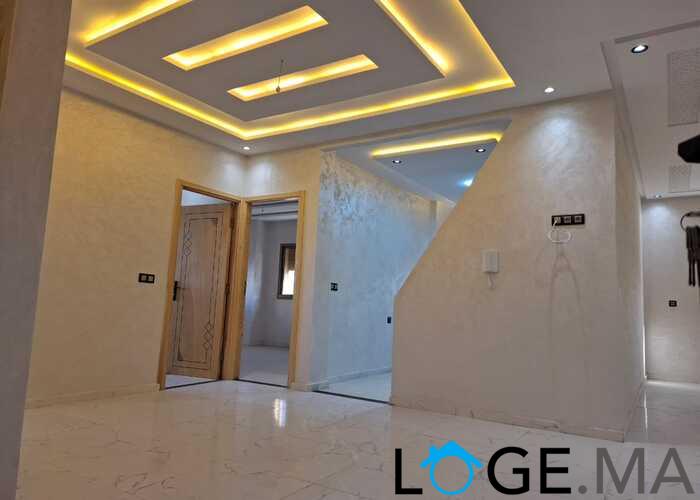 appartement de 103 m2 habitable avec escalier privative 2 façades dans R+2 a al bousstan el jadida.