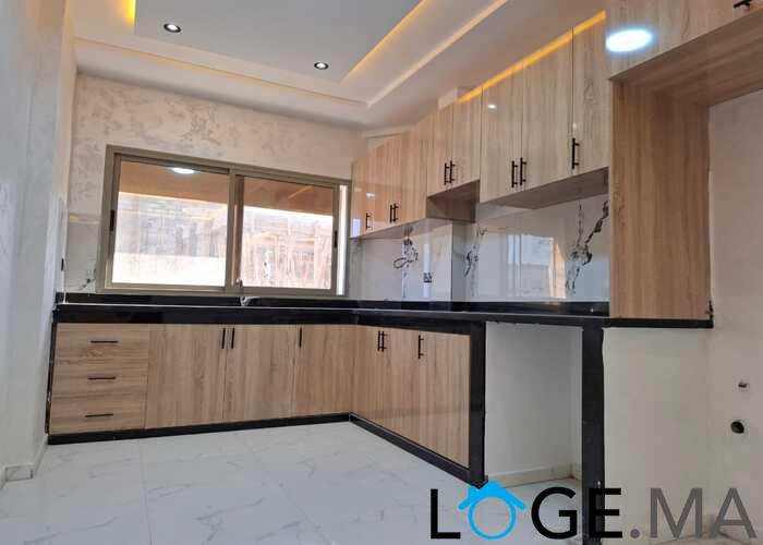 appartement de 103 m2 habitable avec escalier privative 2 façades dans R+2 a al bousstan el jadida.