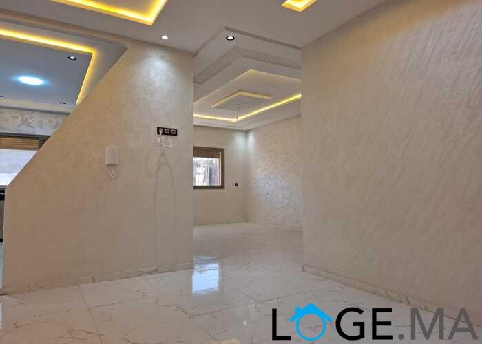 appartement de 103 m2 habitable avec escalier privative 2 façades dans R+2 a al bousstan el jadida.