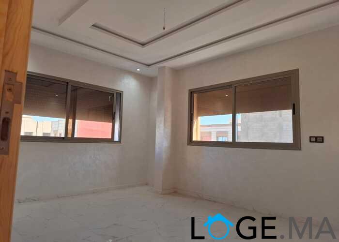 appartement de 103 m2 habitable avec escalier privative 2 façades dans R+2 a al bousstan el jadida.