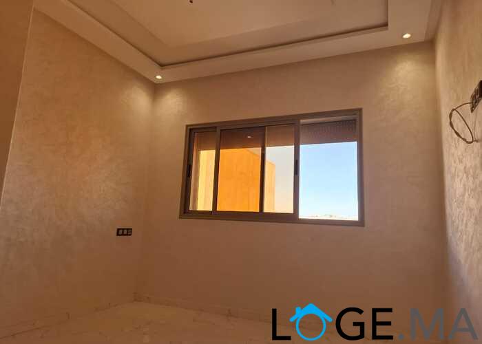 appartement de 103 m2 habitable avec escalier privative 2 façades dans R+2 a al bousstan el jadida.