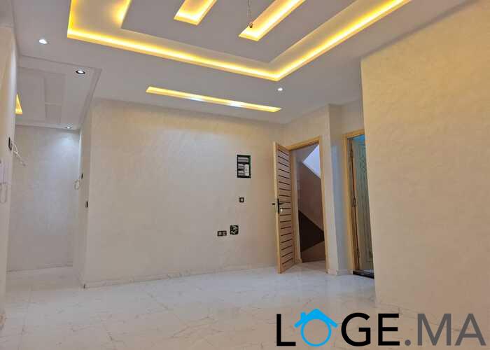 appartement de 103 m2 habitable avec escalier privative 2 façades dans R+2 a al bousstan el jadida.