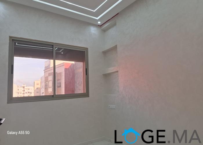 Appartement de façade opposé dans R+2 escalier privatif de 112 m2 près marjane el jadida. 