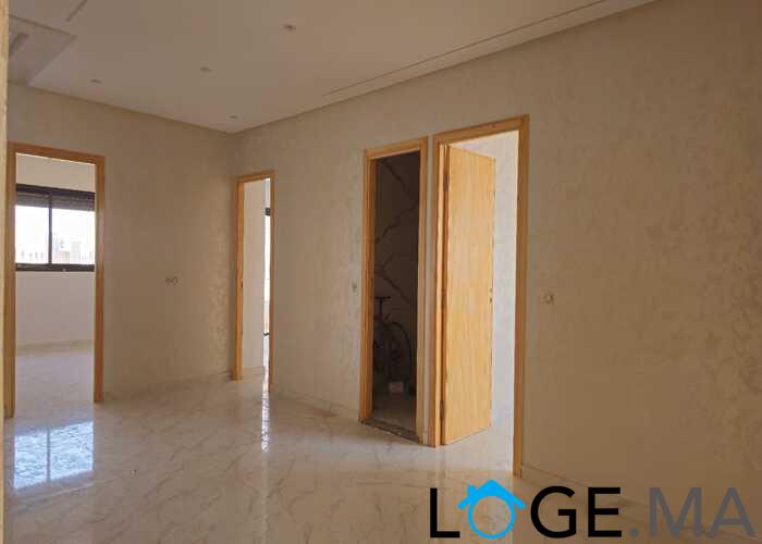 Appartement a vendre dans R+2 ,de 153 m2 près albousstane a el jadida.