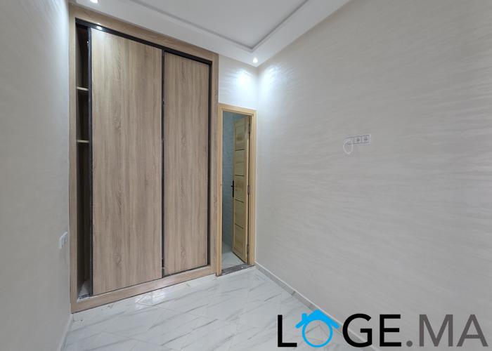 Appartement a vendre RDC dans R+2 a al bousstane el jadida. 