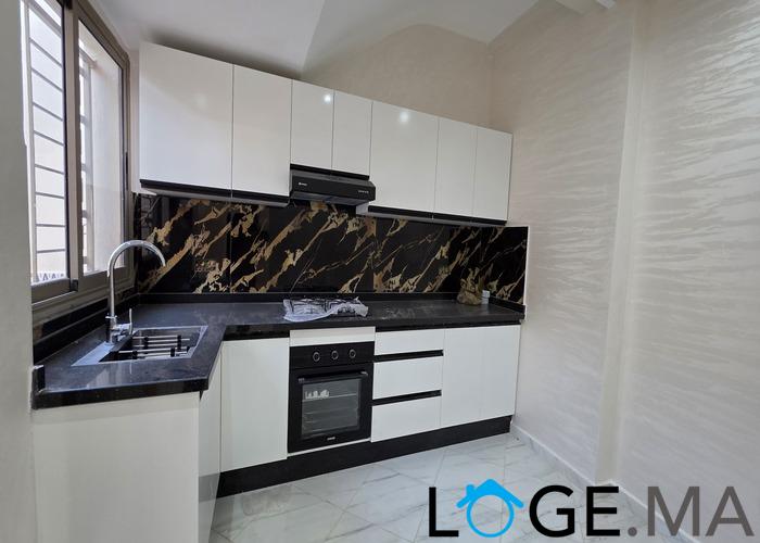 Appartement a vendre RDC dans R+2 a al bousstane el jadida. 