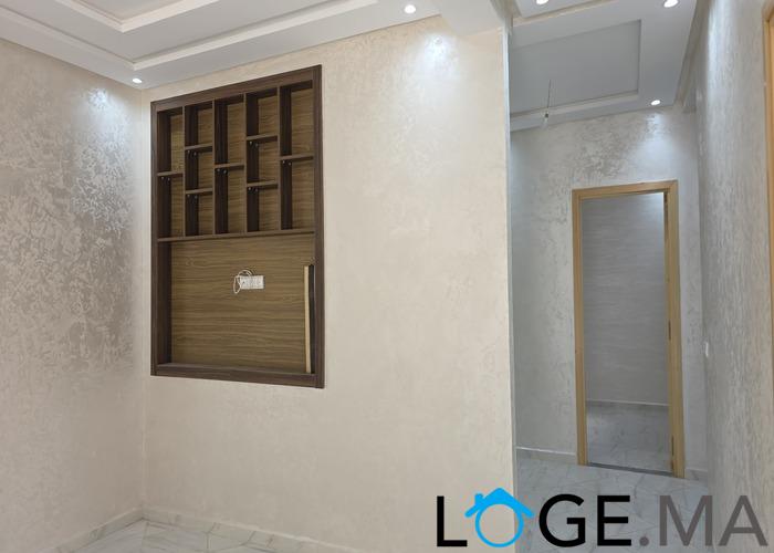 Appartement a vendre RDC dans R+2 a al bousstane el jadida. 