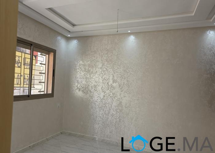 Appartement a vendre RDC dans R+2 a al bousstane el jadida. 