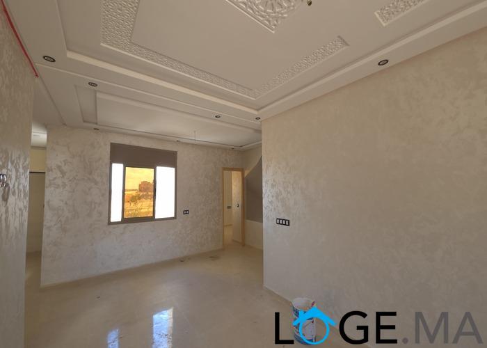 Appartement a vendre escalier privatif, au 1er étage bien ensoleillé avec grande surface a el jadida.
