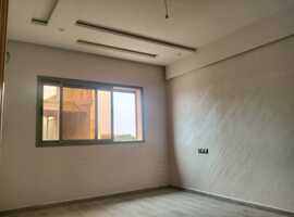 Appartement de 113 m2 de 2 façades dans une R+2 escalier privative a al bosstane El jadida.