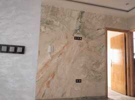 Appartement de 113 m2 de 2 façades dans une R+2 escalier privative a al bosstane El jadida.