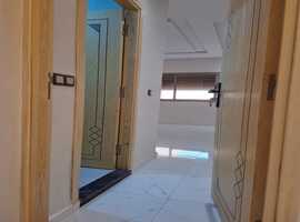 appartement de 103 m2 habitable avec escalier privative 2 façades dans R+2 a al bousstan el jadida.