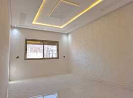 appartement de 103 m2 habitable avec escalier privative 2 façades dans R+2 a al bousstan el jadida.