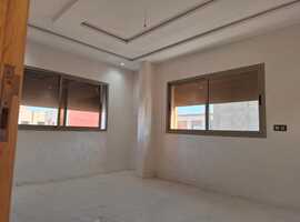 appartement de 103 m2 habitable avec escalier privative 2 façades dans R+2 a al bousstan el jadida.
