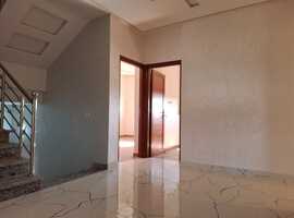 Niveau de villa d3 128 m2 a al bosstane El jadida.