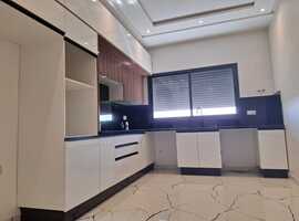 Niveau de villa d3 128 m2 a al bosstane El jadida.