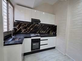 Appartement a vendre RDC dans R+2 a al bousstane el jadida. 