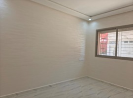 Appartement a vendre RDC dans R+2 a al bousstane el jadida. 