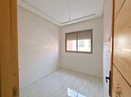 Appartement a vendre  de 82 m2 au 2ème étage de deux façades a Al bousstane el jadida.