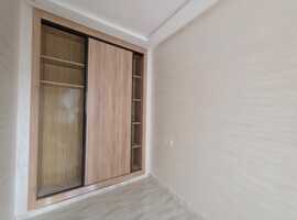 Appartement a vendre  de 82 m2 au 2ème étage de deux façades a Al bousstane el jadida.